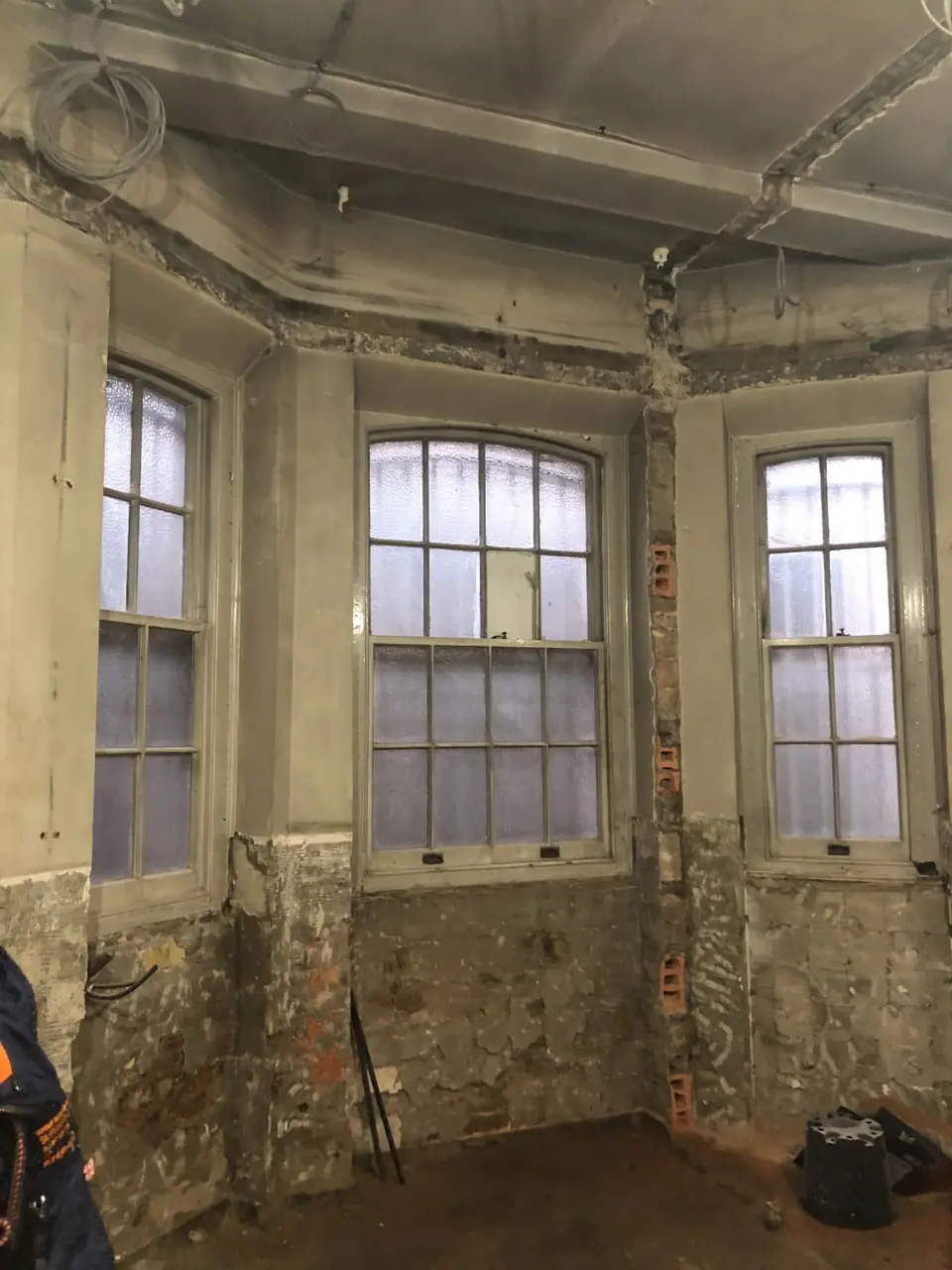 Bay window room in the listed building during strip-out