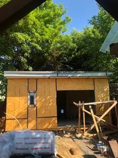 Annex frame under construction with OSB sheathing